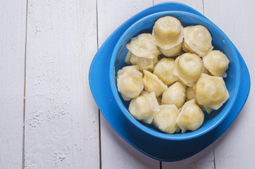 plate of fresh ravioli with meat