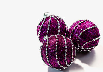 A three purple decorative bowl on a white background