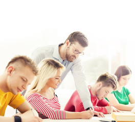 Group of teenage students and a teacher