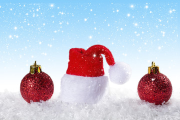 Fototapeta na wymiar Christmas background with Christmas balls and cap of Santa Claus