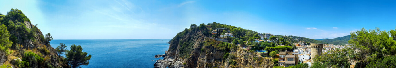 Fototapeta na wymiar Panoramic view of resort town and beach. Blanes, Catalonia, Spain