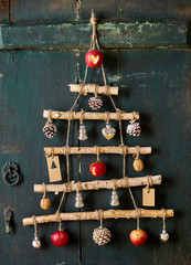 Christmas tree design made from baubles and string