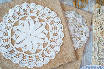 Lace and linen home decoration elements, top view