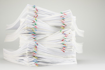 Pile overload of document with colorful paper clip