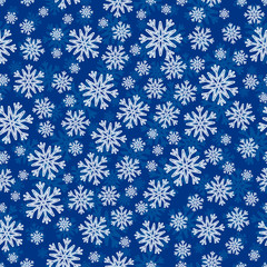 Christmas seamless pattern with white blue snowflakes