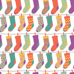Materiał do szycia Vector seamless pattern with christmas socks.