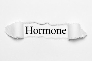 Hormone auf weißen gerissenen Papier