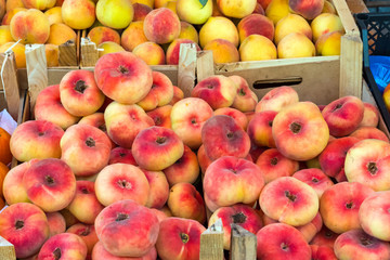 Different kinds of peaches for sale at a market in Palermo