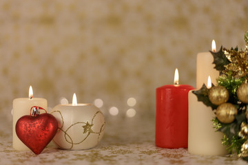 Christmas greeting card with tree, candles, lights and heart decoration.