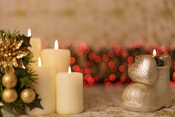 Greeting card with Christmas tree, candles, lights and heart decoration.