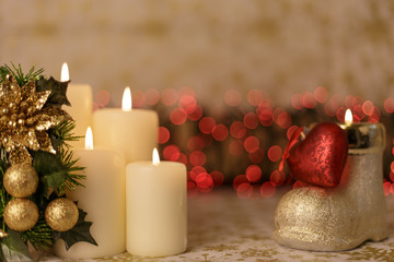 Greeting card with Christmas tree, candles, lights and heart decoration.