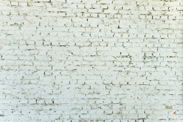 Old weathered white brick wall. Vintage texture Background.