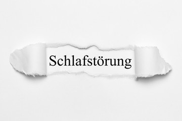Fototapeta premium Schlafstörung auf weißen gerissenen Papier