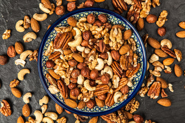 Mix of different nuts closeup photo