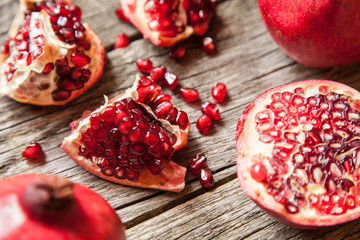 Pomegranates on wooden table