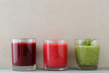 Three glasses with fruit smoothie
