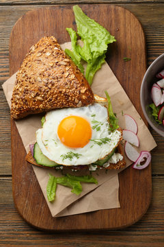 Breakfast sandwich with egg and lettuce
