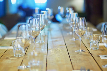 Row of wine glasses on the table in restaurant