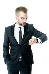 Handsome bearded man wearing suit, portrait shot in studio