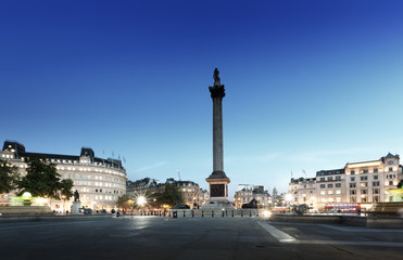 Trafalgar Square with Nelson Column at night, London, UK - obrazy, fototapety, plakaty
