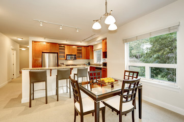 Fresh apples on modern dining table . Apartment interior
