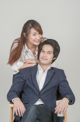happy young couple shooting in studio
