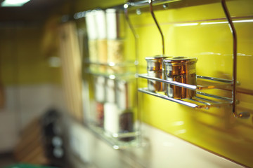 Salt Cellar and other spices in the kitchen railings