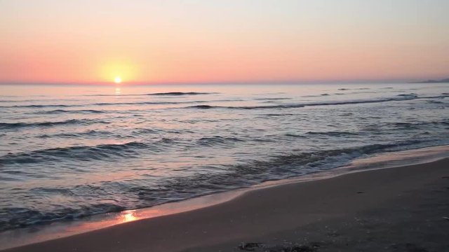 Beautiful sunrise on a mediterranean beach