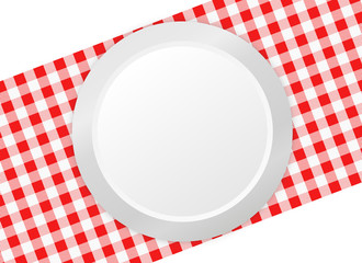 Plate on tablecloth