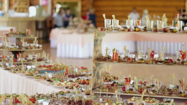 Various snacks at the wedding table, the camera moves smoothly.