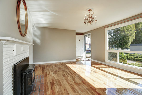 Bright Sunny Empty Living Room And Entryway Interior