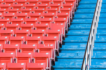 Obraz premium Empty orange seats at stadium,Rows of seat on a soccer stadium