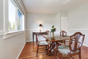 Dining room interior with carved wooden furniture