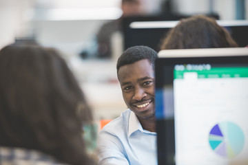 Group of multi ethnic business people at work, small business en