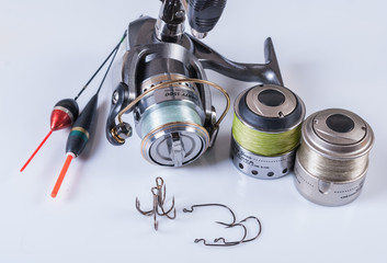 reel, fishing lines, hooks and floats