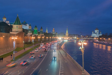 Traffic near Kremlin with river in moscow at night