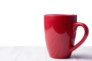 Red cup on a white table