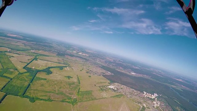 Skydiver is  opening parachute, pov