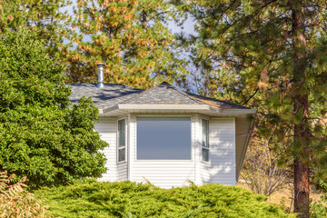 The top of the house or log cabin with nice window.