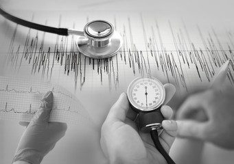 Medical equipment collage, closeup. Cardiology concept. Black and white photo.