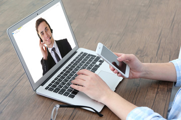 Video call with technical support operator. Helpdesk service concept.