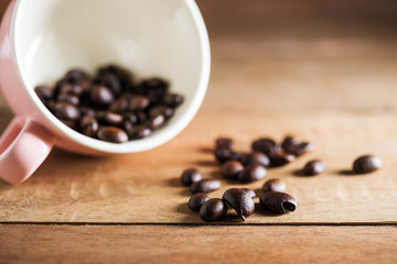 Vintage coffee bean on brown wooden