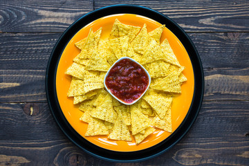 Mexican nachos chips  on wooden background