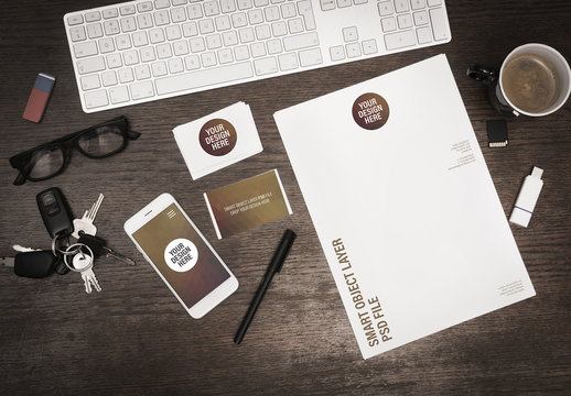 Smartphone and Stationery on Wooden Desk Mockup 3