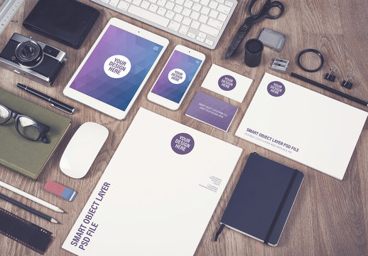 Smartphone, Tablet, and Stationery on Wooden Desk Mockup 2