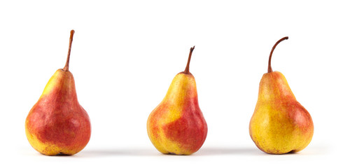 Yellow ripe fresh pear on white