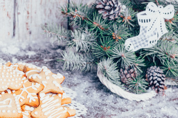 Christmas composition with gingerbread on wooden background