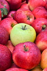 Fresh organic apples on street market stall