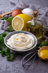 Homemade mayonnaise sauce and olive oil, eggs, mustard, lemon