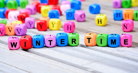 Winter time words on table